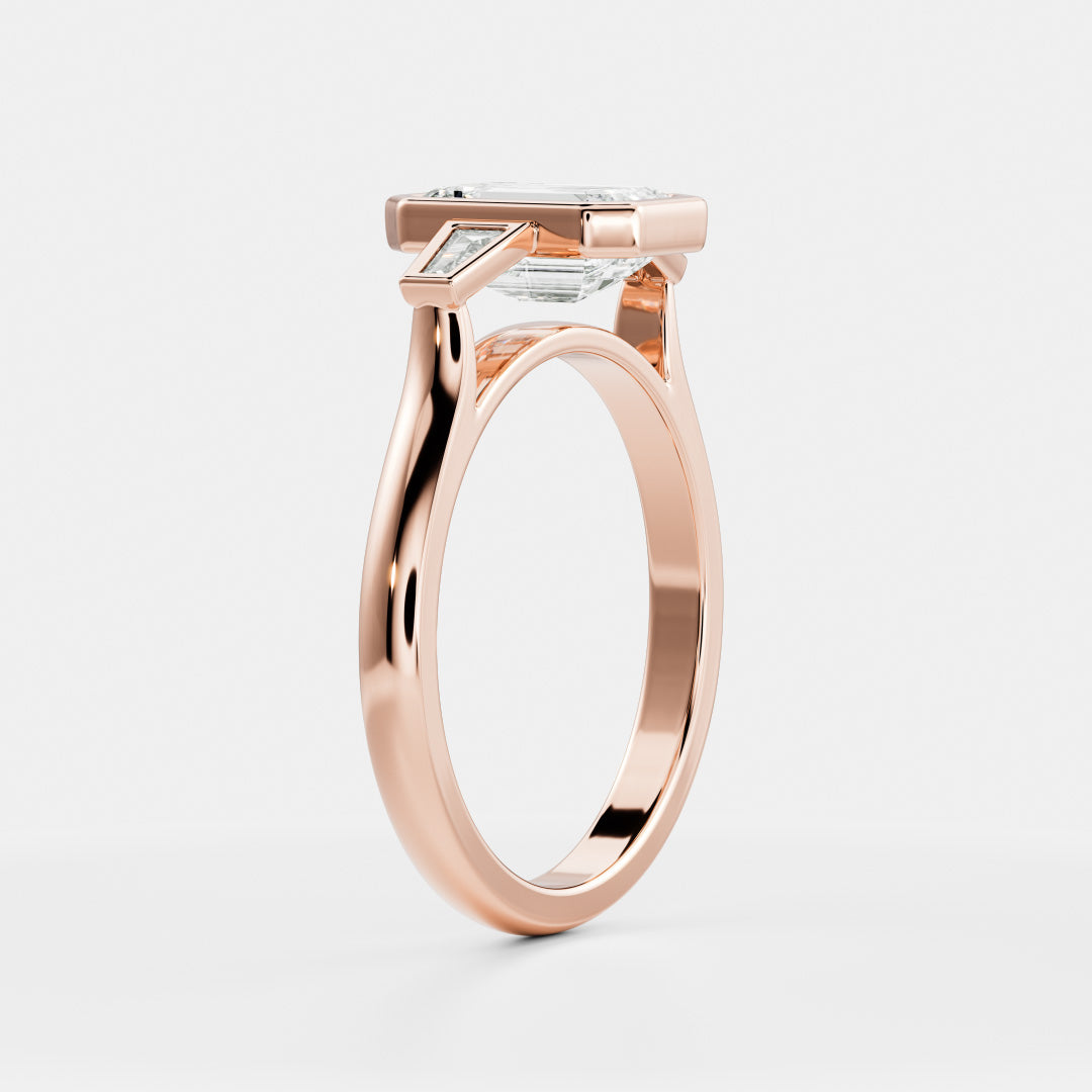 The René Ring - Emerald and Tapered Baguette Trilogy