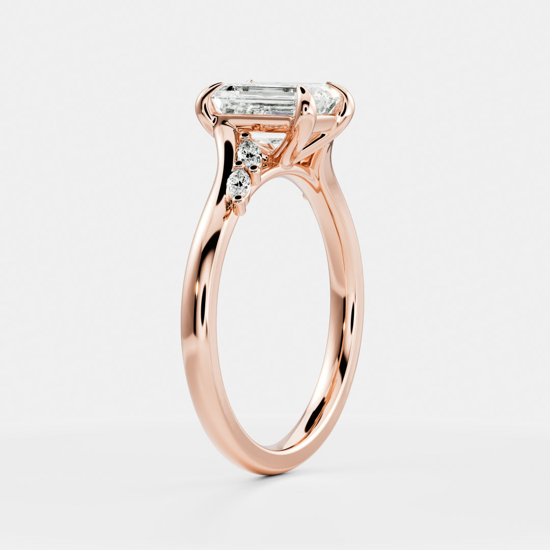The Amira Ring™ - Emerald with Marquise Accents