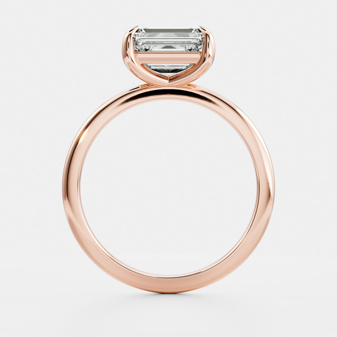 The Cora Ring - Horizontal Emerald Solitaire