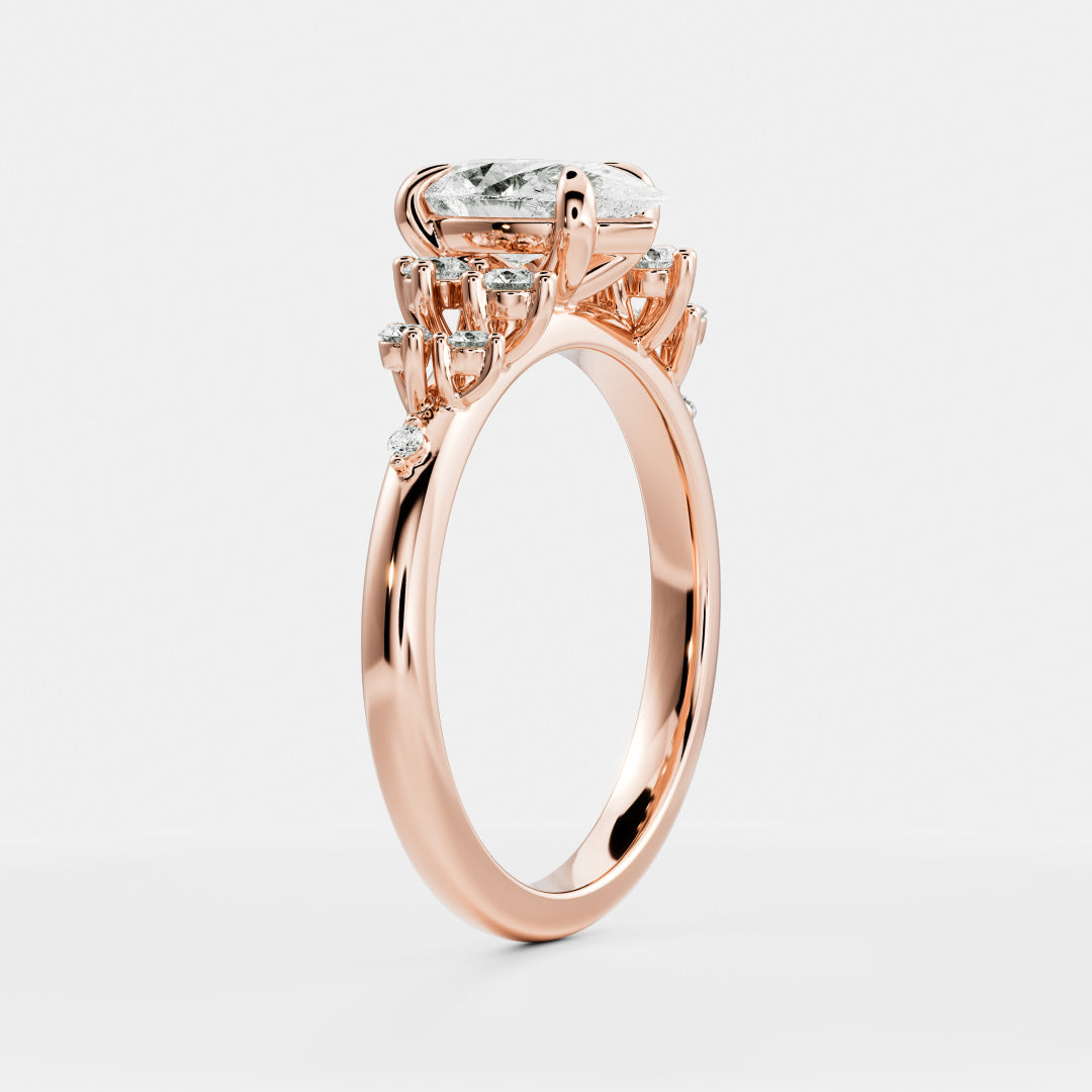 The Aurora Ring - Pear with Round Brilliant Accents