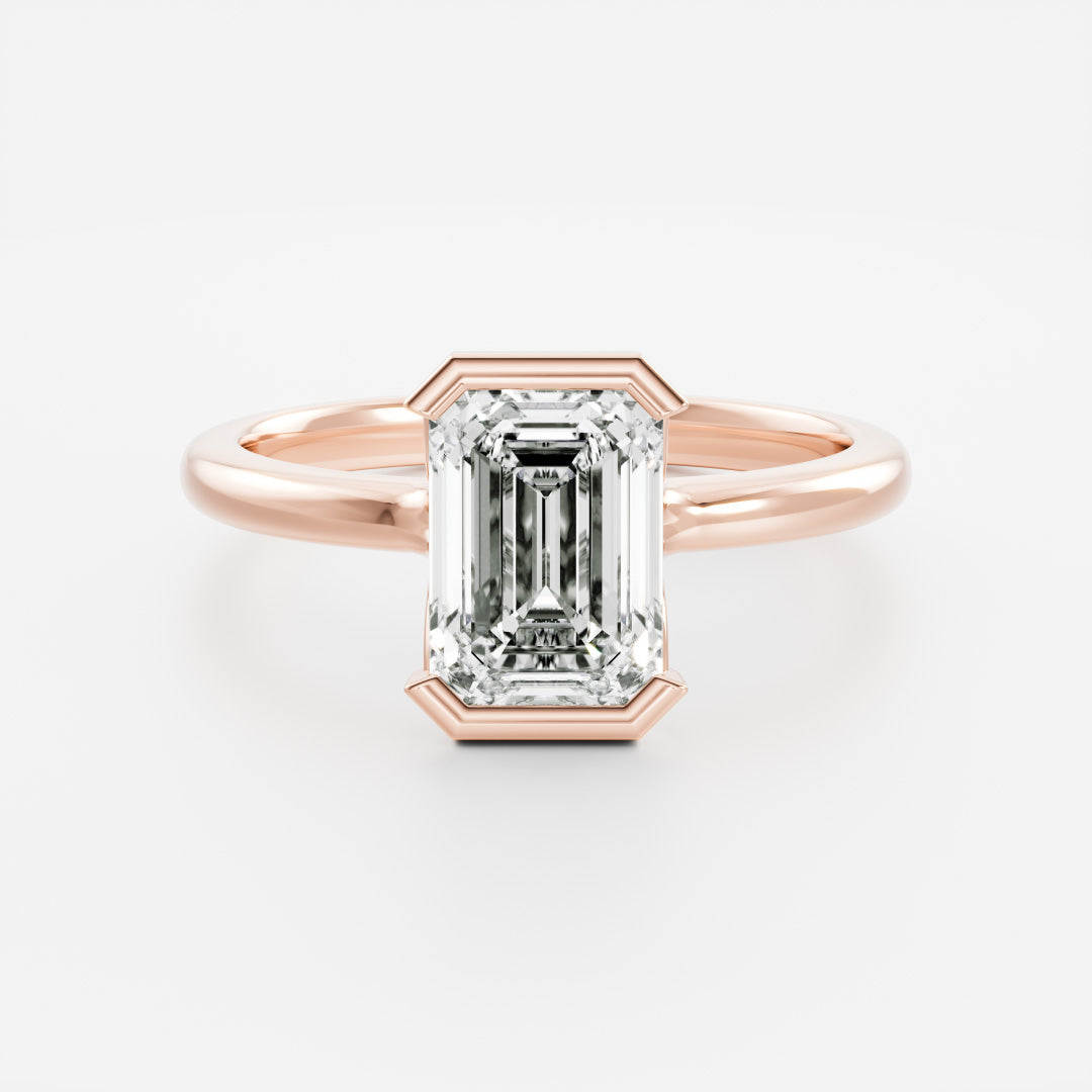 The Audrey Ring - Emerald Half Bezel Solitaire
