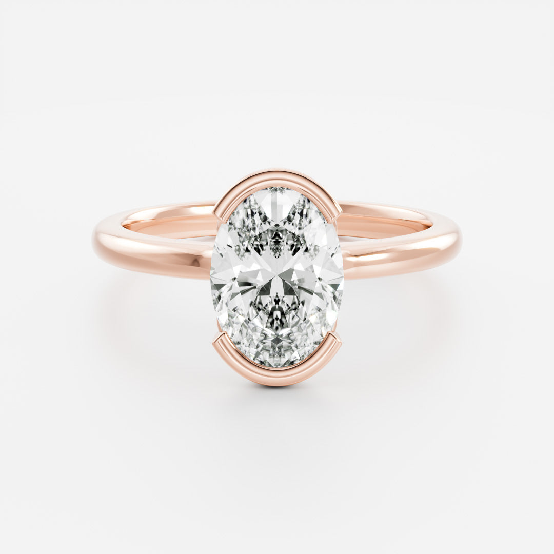 The Luise Ring® - Oval Half Bezel Solitaire