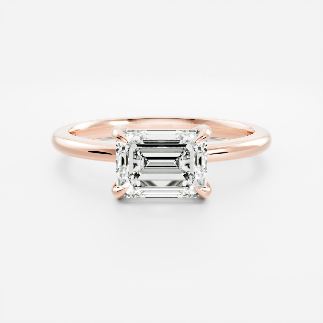 The Cora Ring - Horizontal Emerald Solitaire