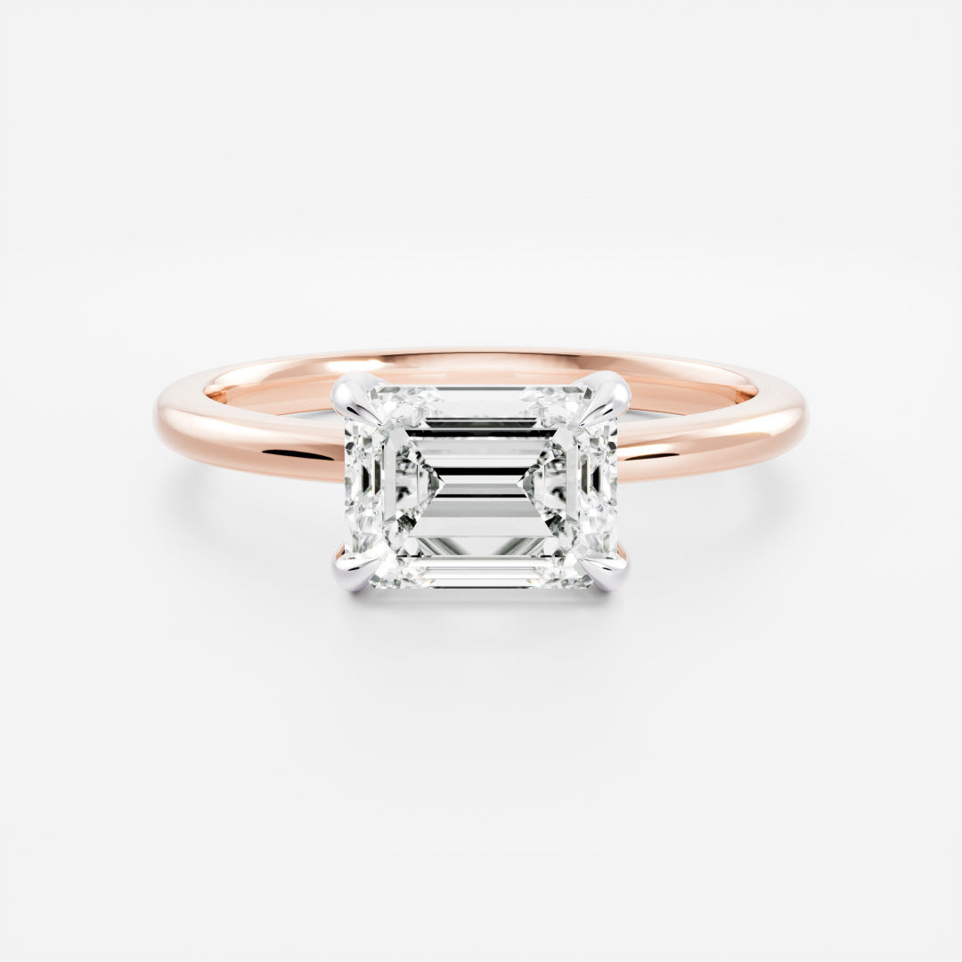The Cora Ring - Horizontal Emerald Solitaire