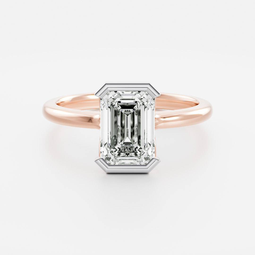 The Audrey Ring - Emerald Half Bezel Solitaire