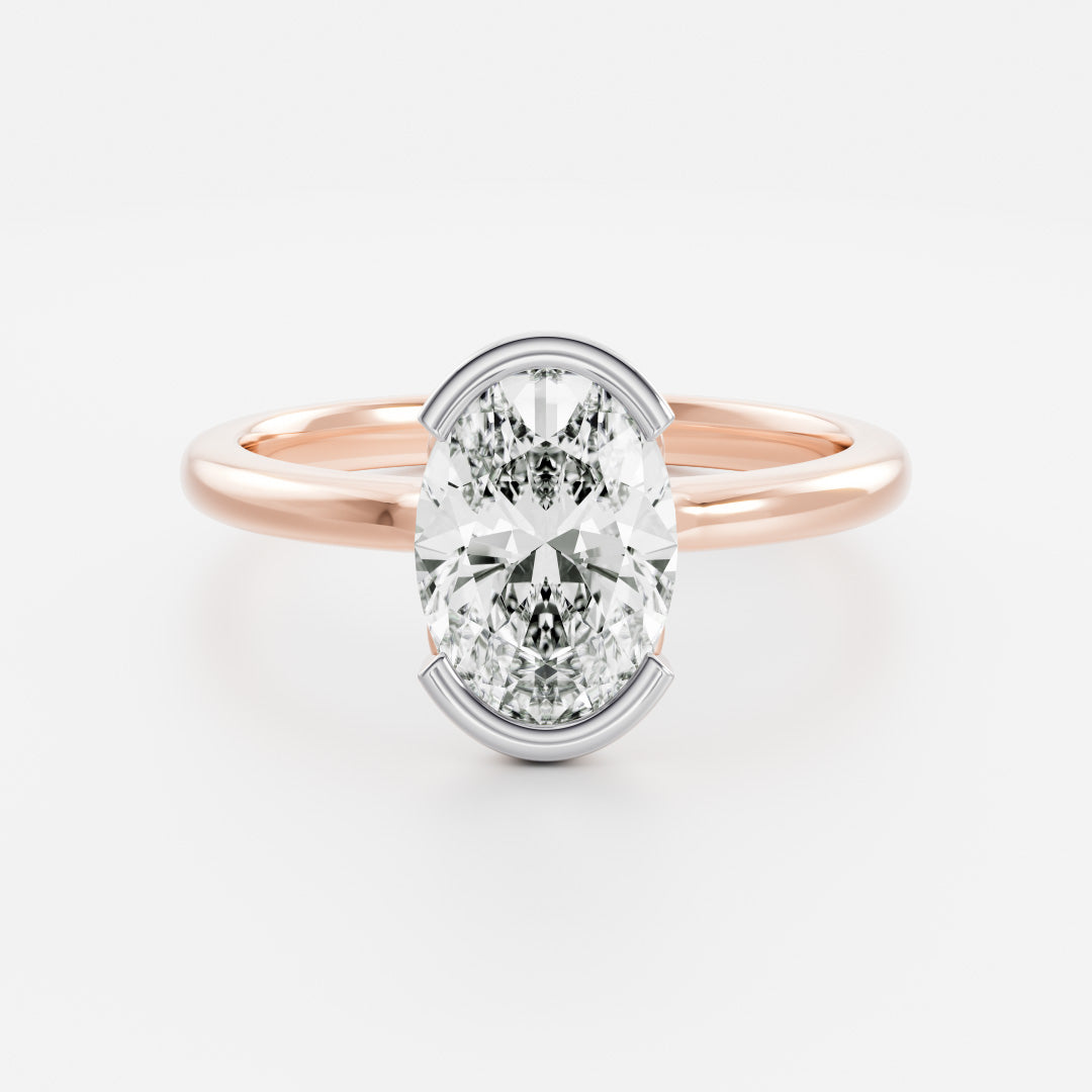 The Luise Ring® - Oval Half Bezel Solitaire