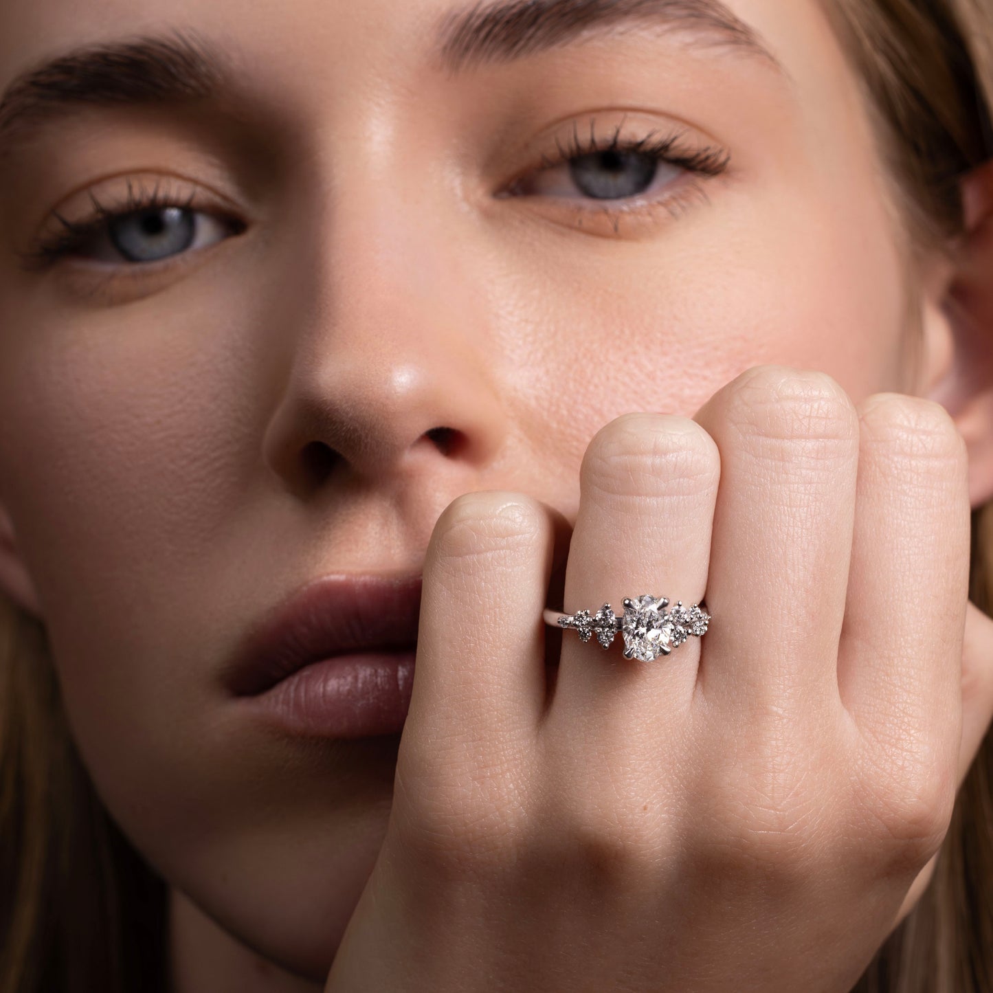 The Aurora Ring - Oval with Round Brilliant Accents
