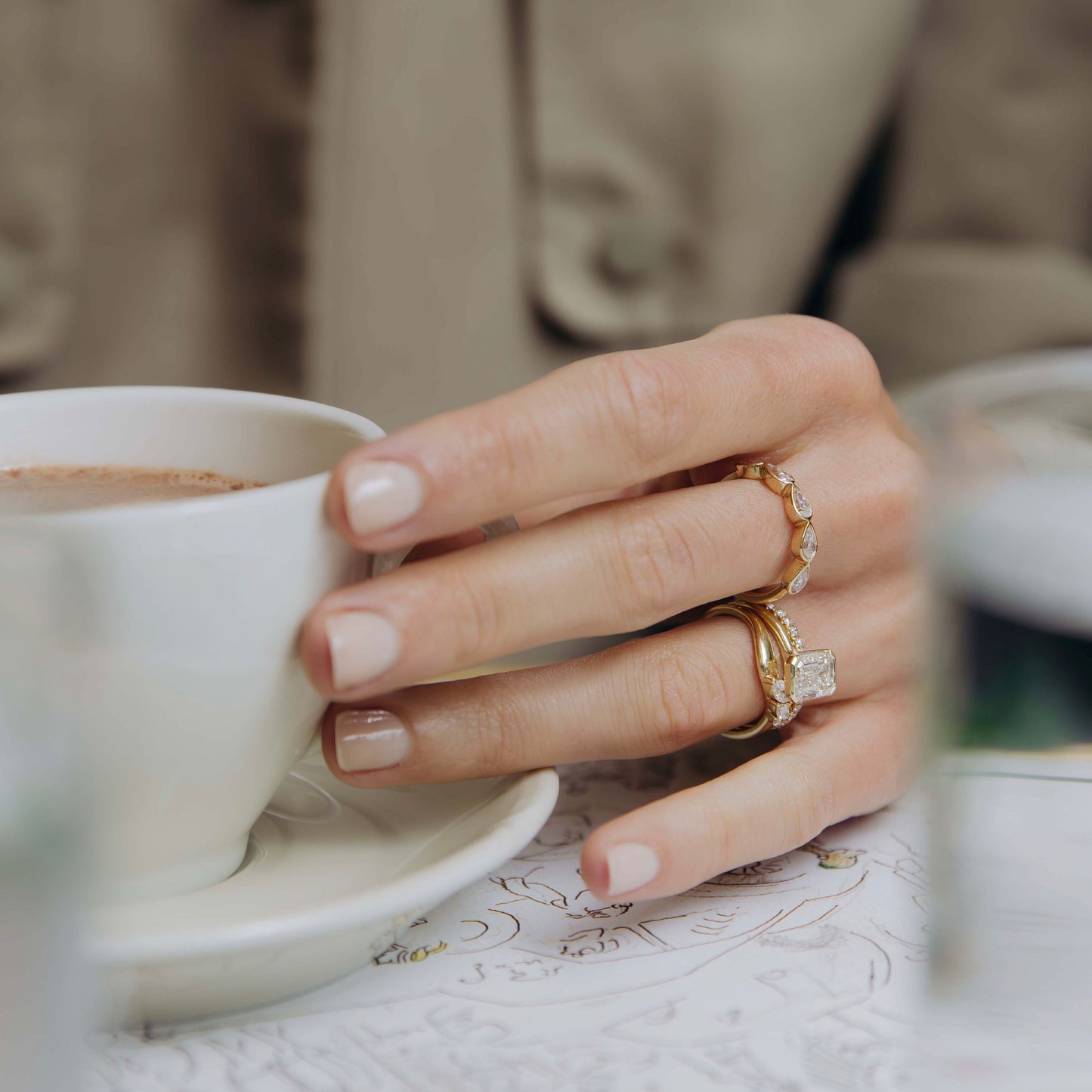 The Audrey Ring - Emerald Half Bezel Solitaire