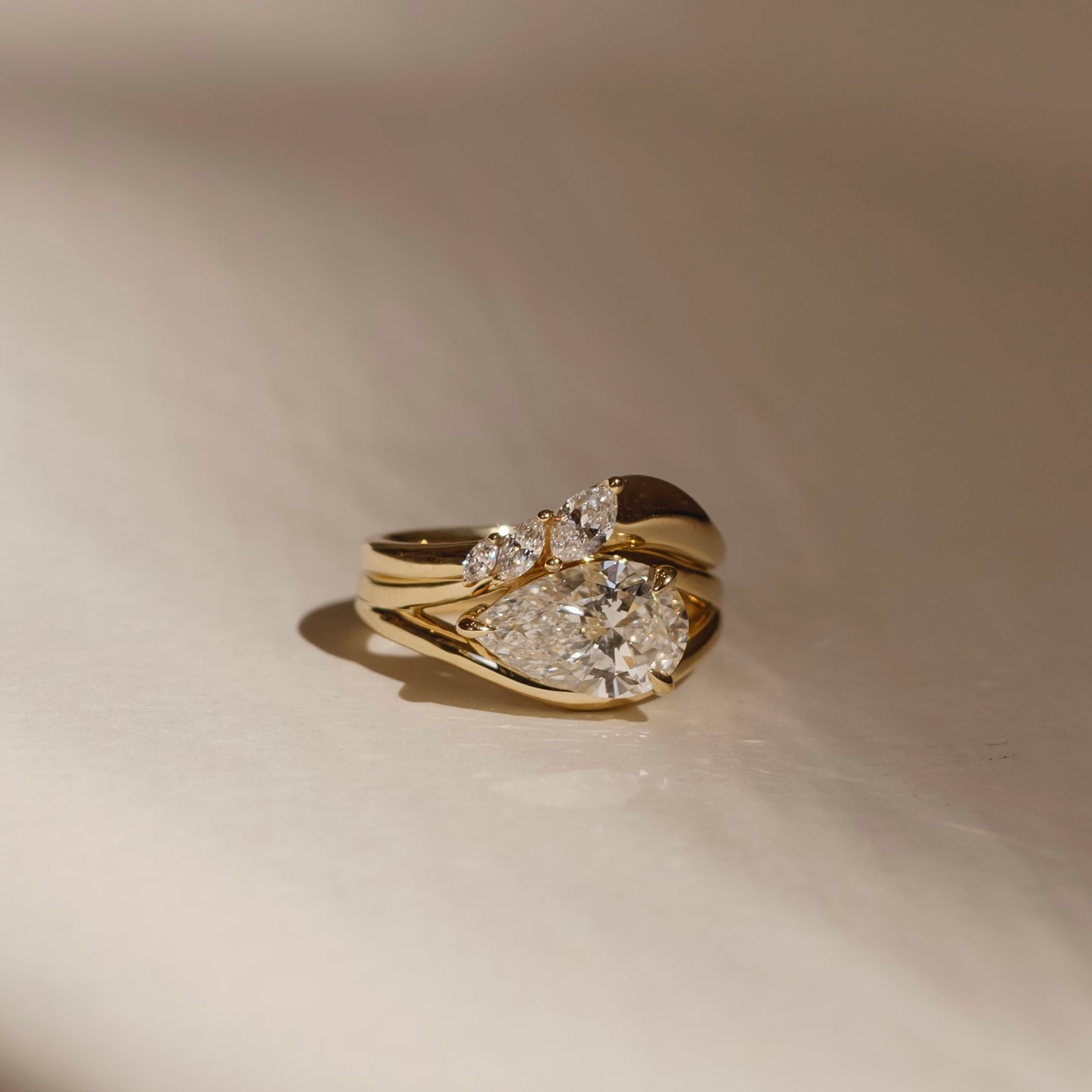 The Aleasa Ring - Split Shank East-West Pear Solitaire