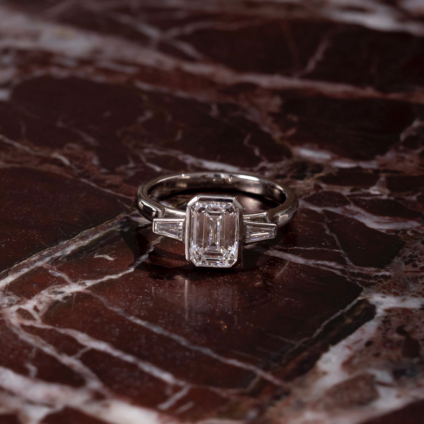 The René Ring - Emerald and Tapered Baguette Trilogy