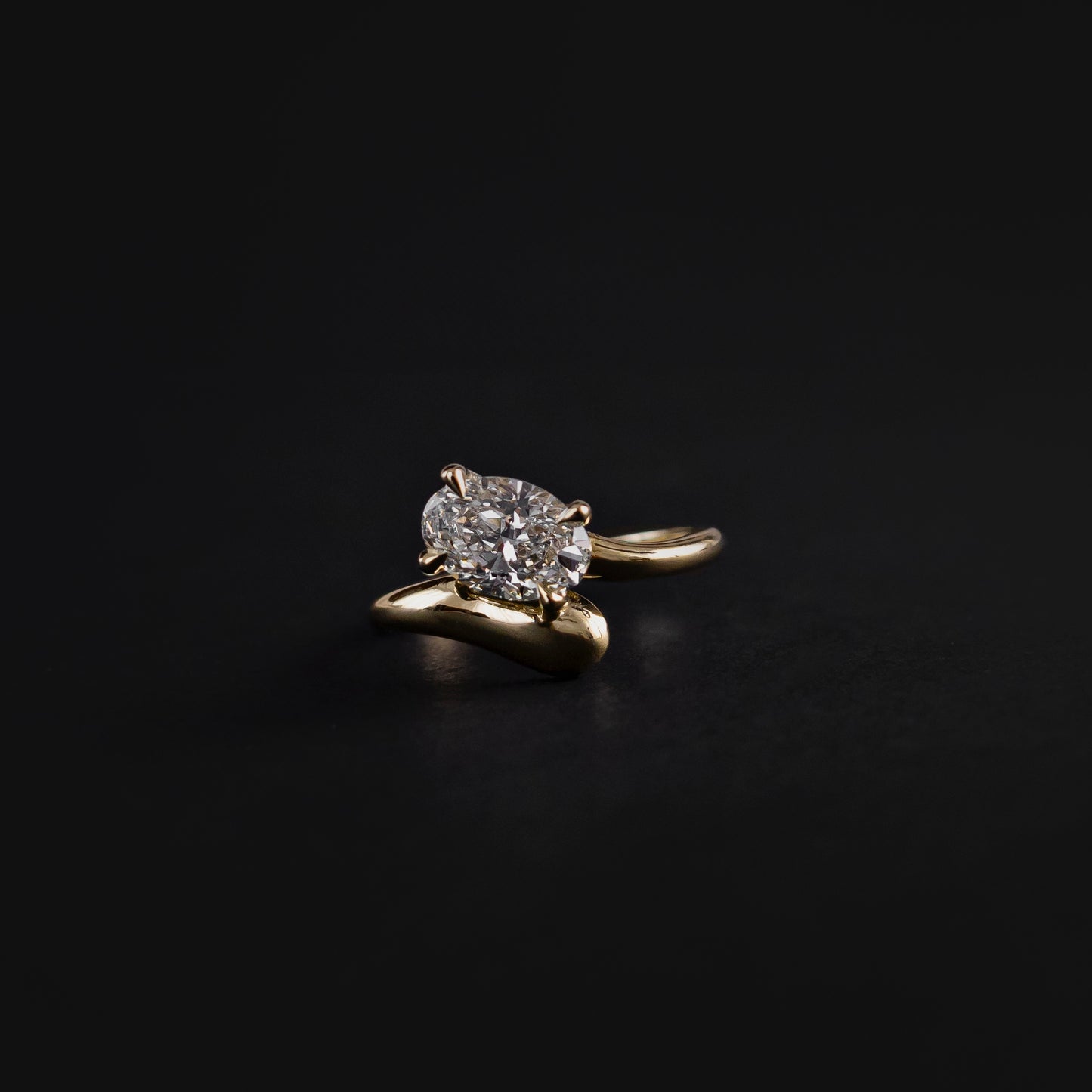 The Sarina Ring - Floating Oval Solitaire with Twisted Band