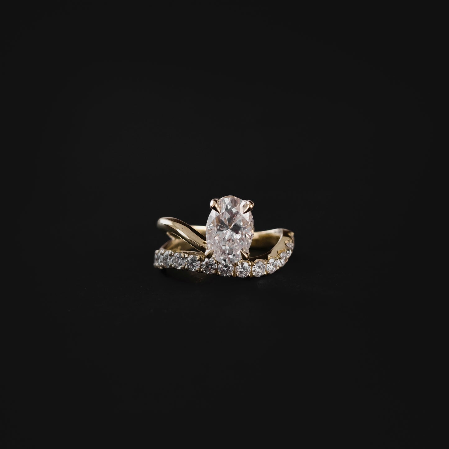 The Elijah Ring - Floating Oval Solitaire with Pavé Band