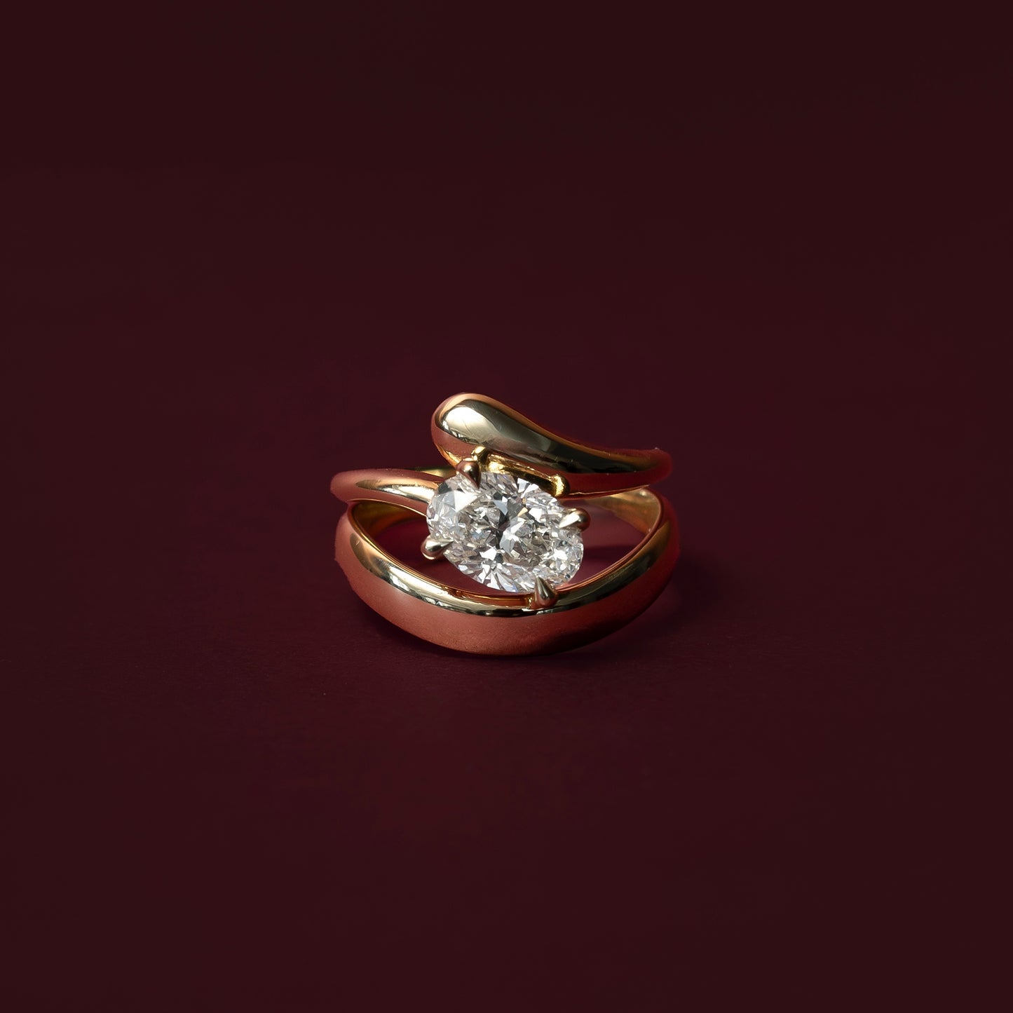The Sarina Ring - Floating Oval Solitaire with Twisted Band