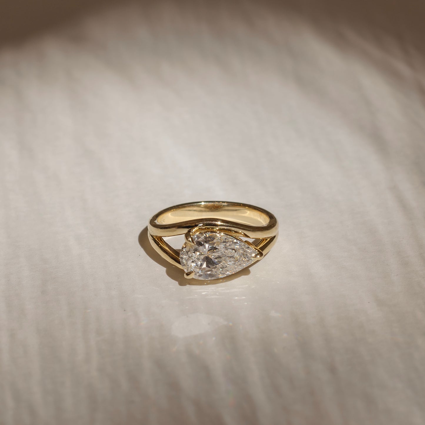 The Aleasa Ring - Split Shank East-West Pear Solitaire