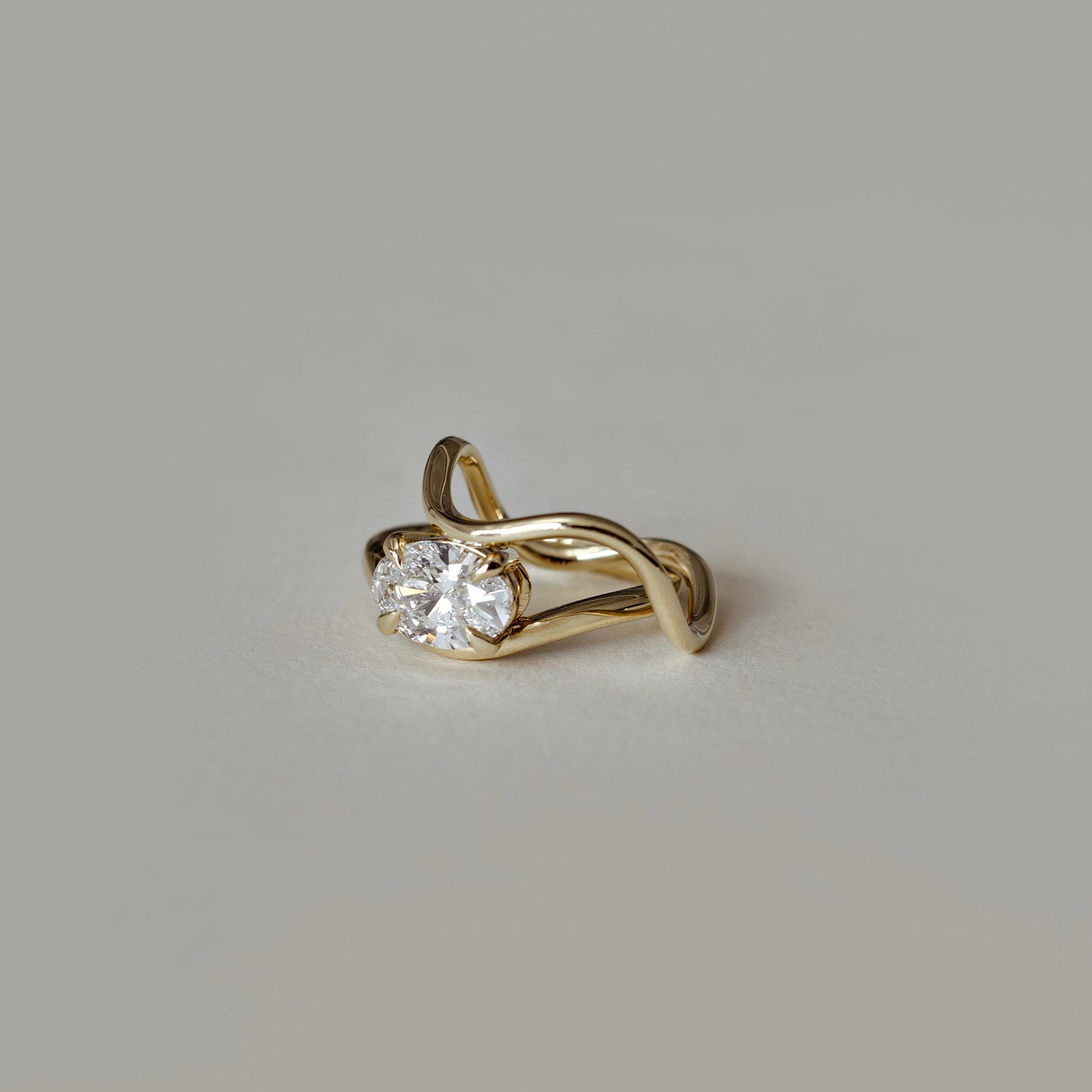 The Maya Ring - Oval Curved Solitaire