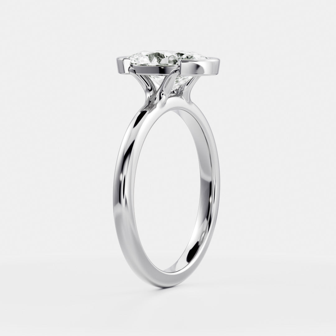 The Luise Ring® - Oval Half Bezel Solitaire