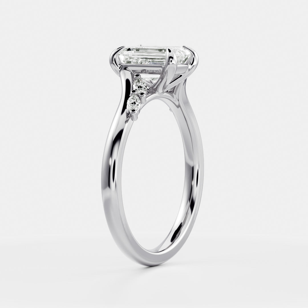 The Amira Ring™ - Emerald with Marquise Accents