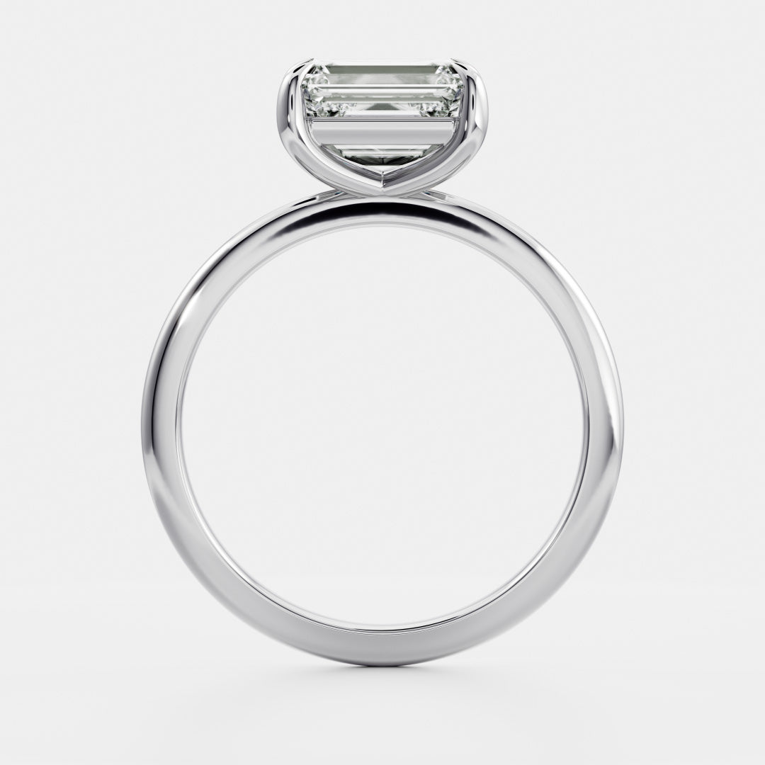 The Cora Ring - Horizontal Emerald Solitaire