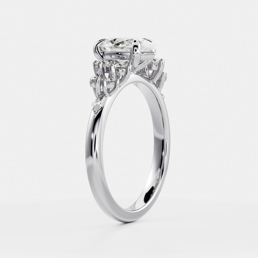 The Aurora Ring - Pear with Round Brilliant Accents