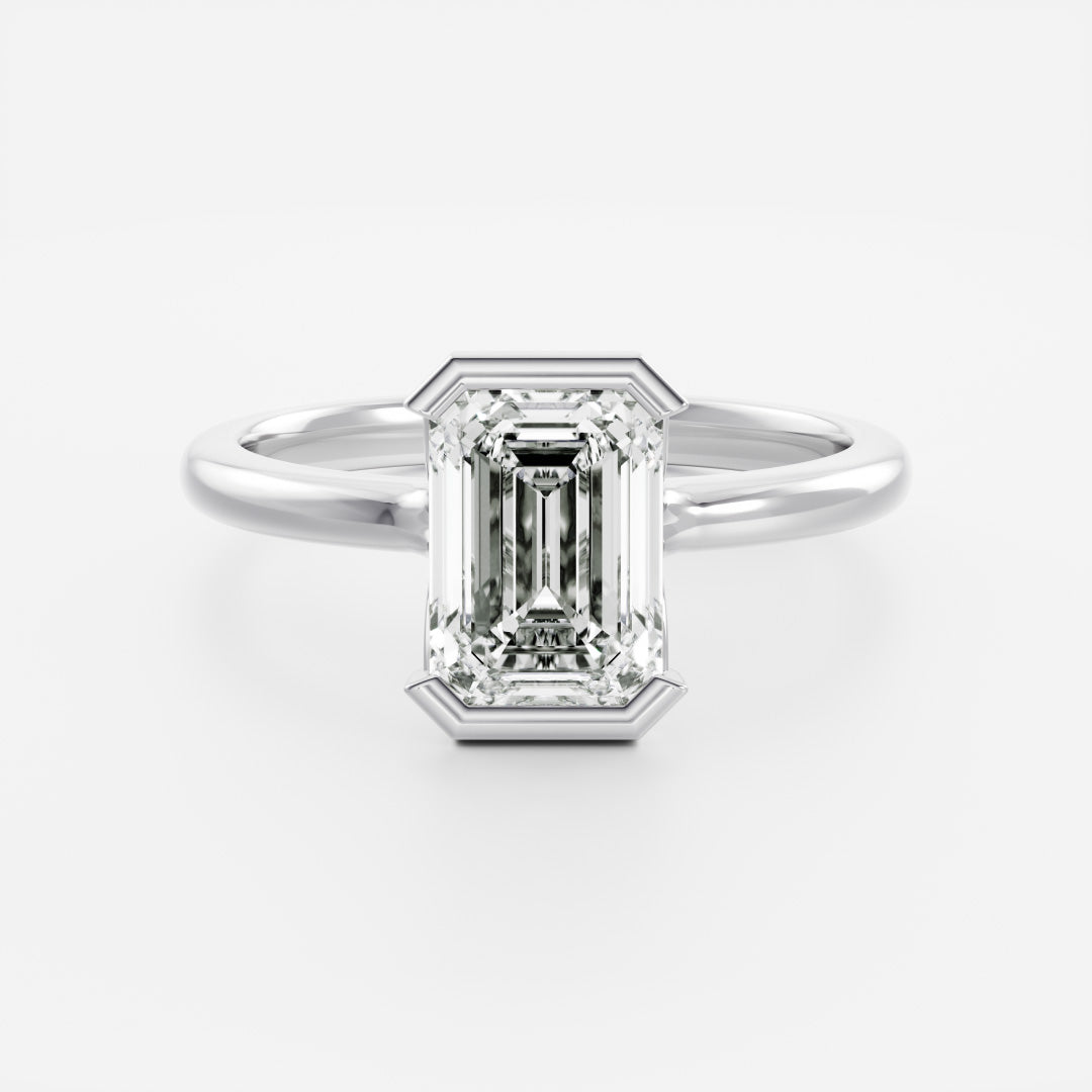 The Audrey Ring - Emerald Half Bezel Solitaire