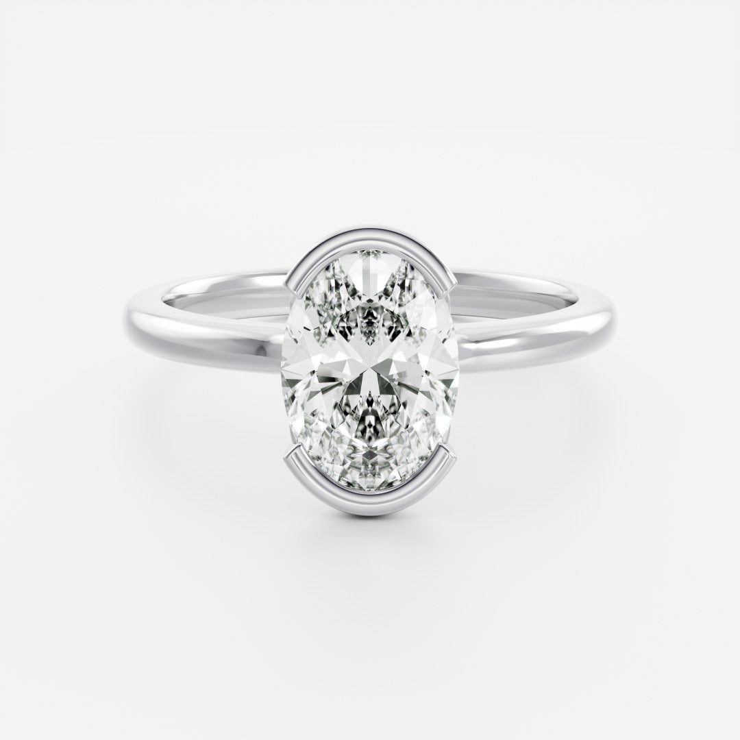 The Luise Ring® - Oval Half Bezel Solitaire