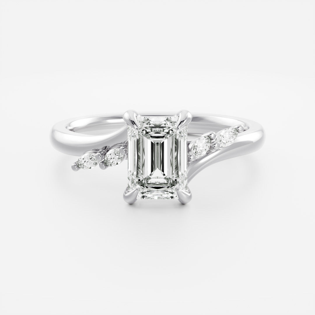 The Amira Ring™ - Emerald with Marquise Accents