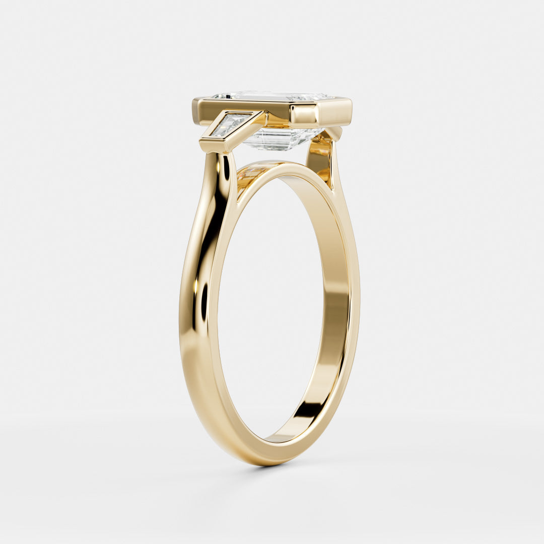 The René Ring - Emerald and Tapered Baguette Trilogy