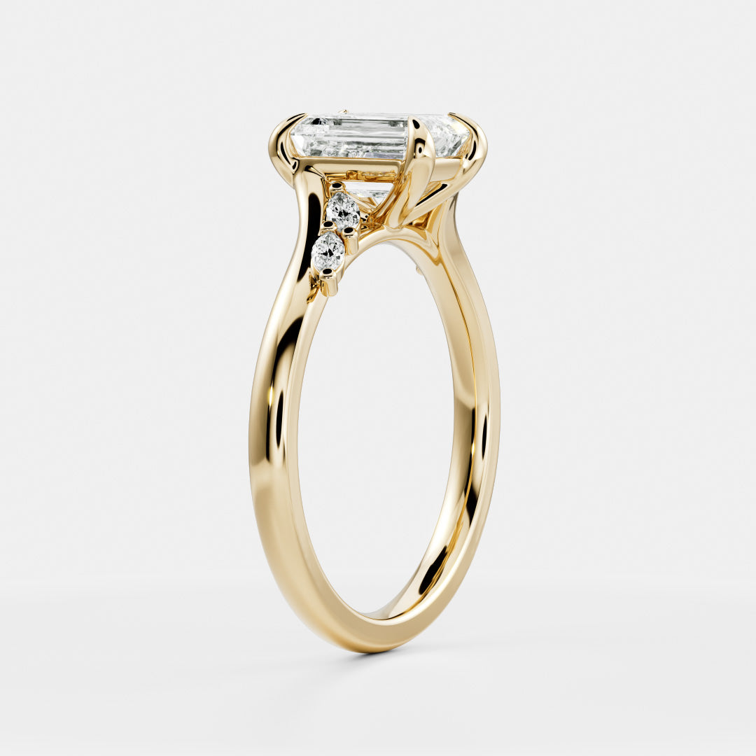 The Amira Ring™ - Emerald with Marquise Accents