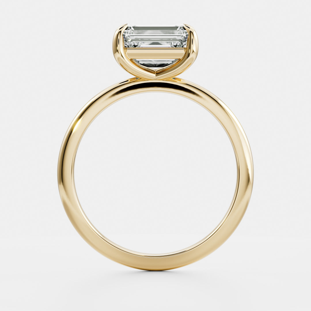The Cora Ring - Horizontal Emerald Solitaire