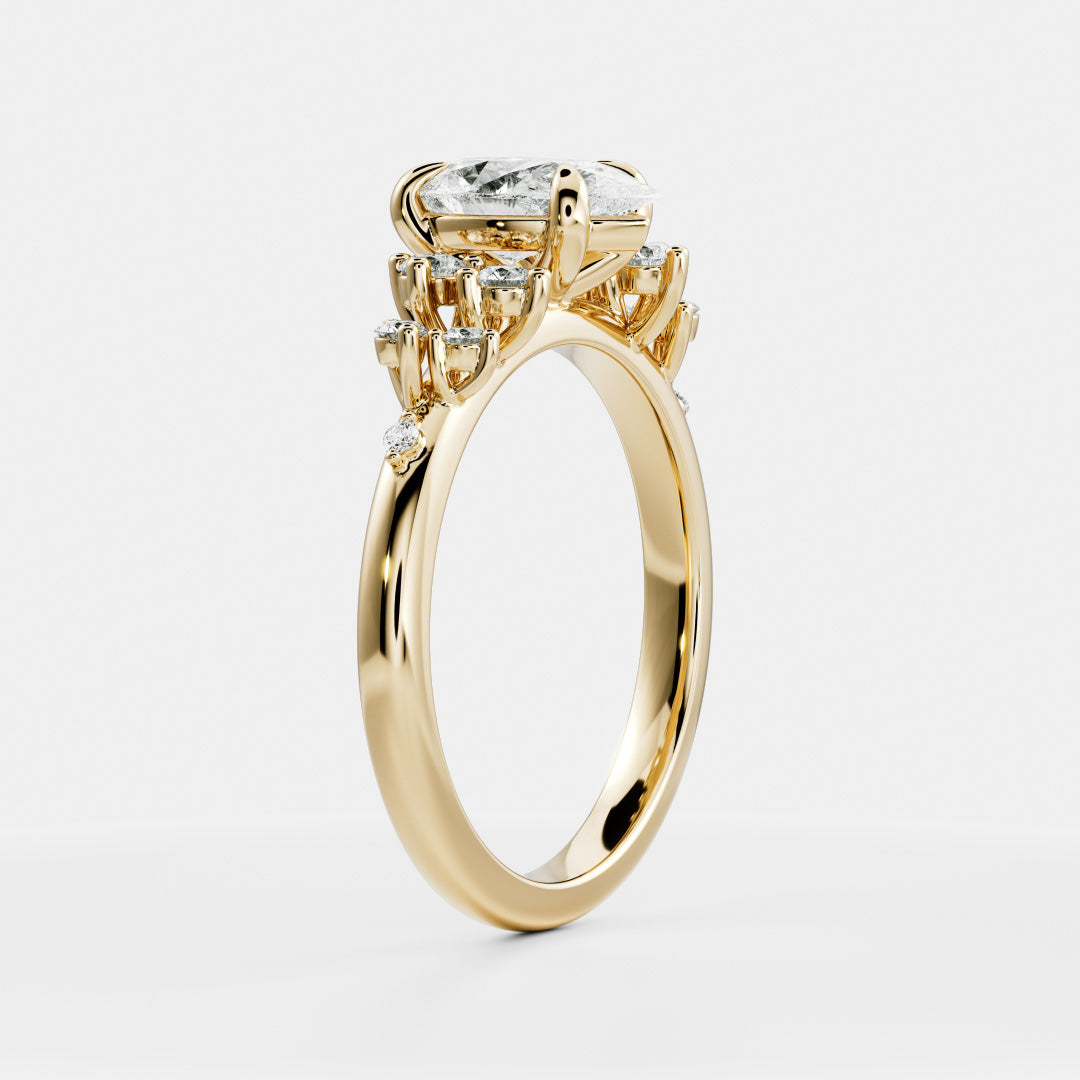 The Aurora Ring - Pear with Round Brilliant Accents