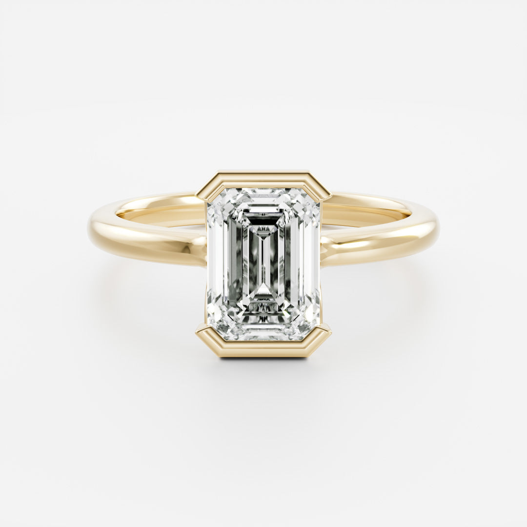 The Audrey Ring - Emerald Half Bezel Solitaire