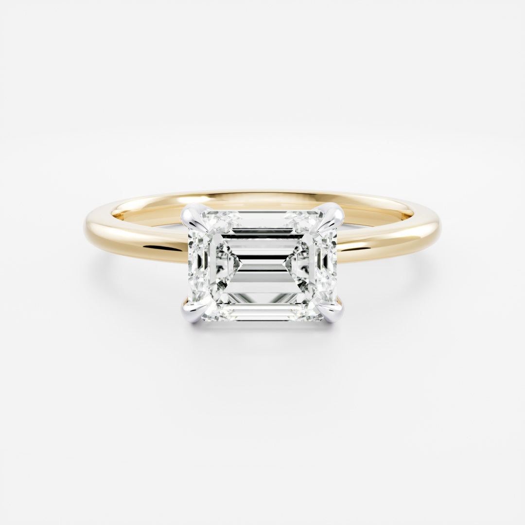The Cora Ring - Horizontal Emerald Solitaire