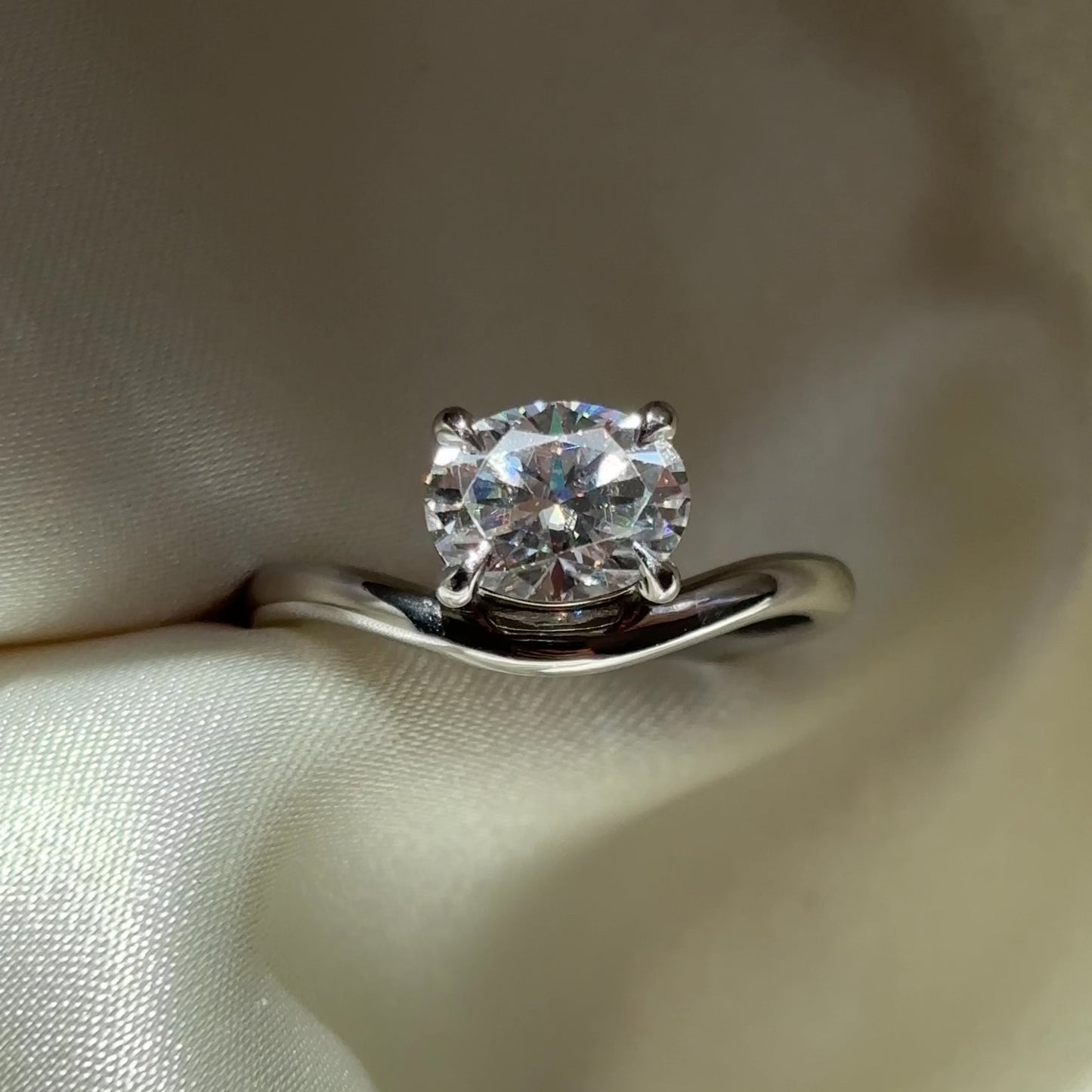 The Maya Ring - 1.5ct Moissanite Oval Curved Solitaire