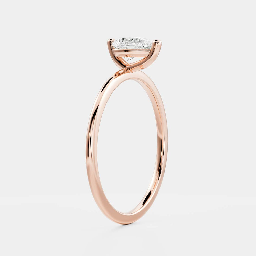 
                      
                        Pear Petite Ring
                      
                    