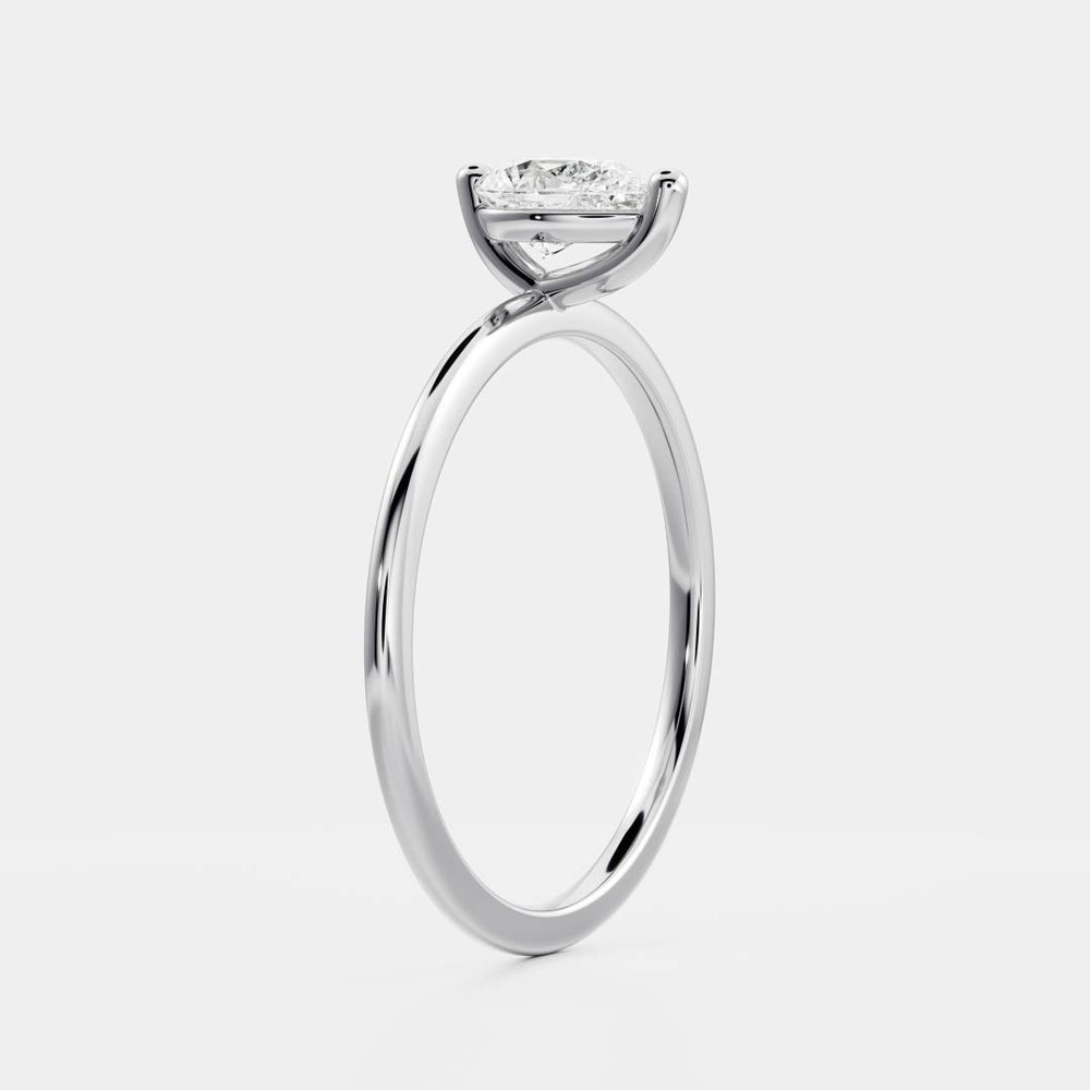 
                      
                        Pear Petite Ring
                      
                    