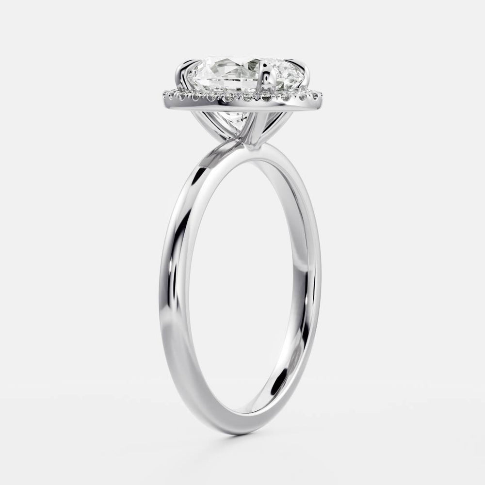 
                      
                        The Luise Ring™ - Oval Halo
                      
                    