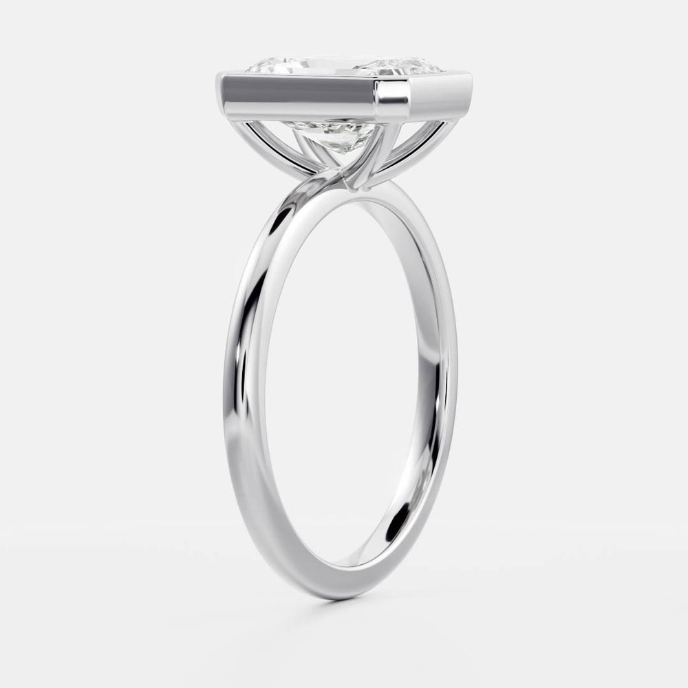 
                      
                        The Vienna Ring - Radiant Bezel Solitaire
                      
                    