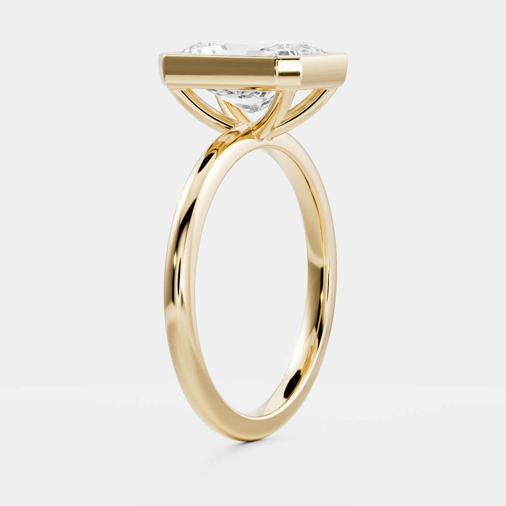 
                      
                        The Vienna Ring - Radiant Bezel Solitaire
                      
                    
