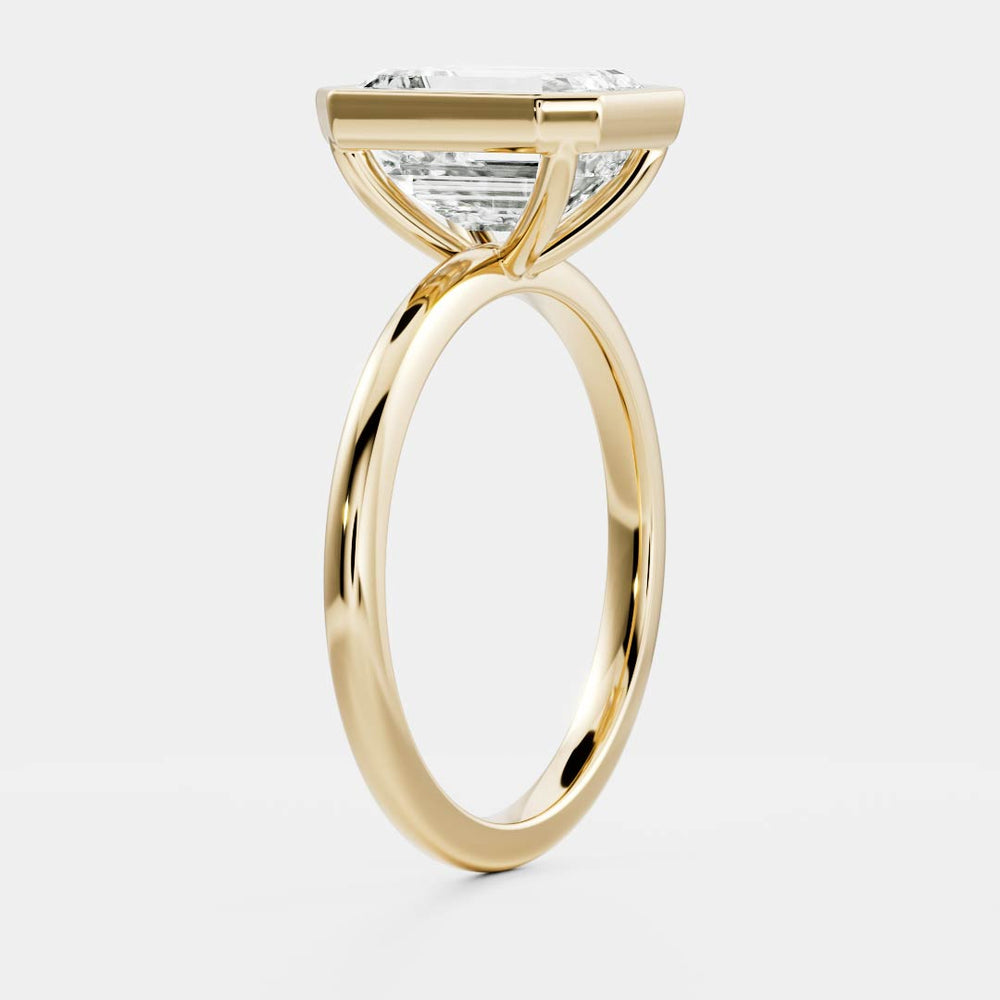 The Audrey Ring - 1.9ct Moissanite Emerald Bezel Solitaire