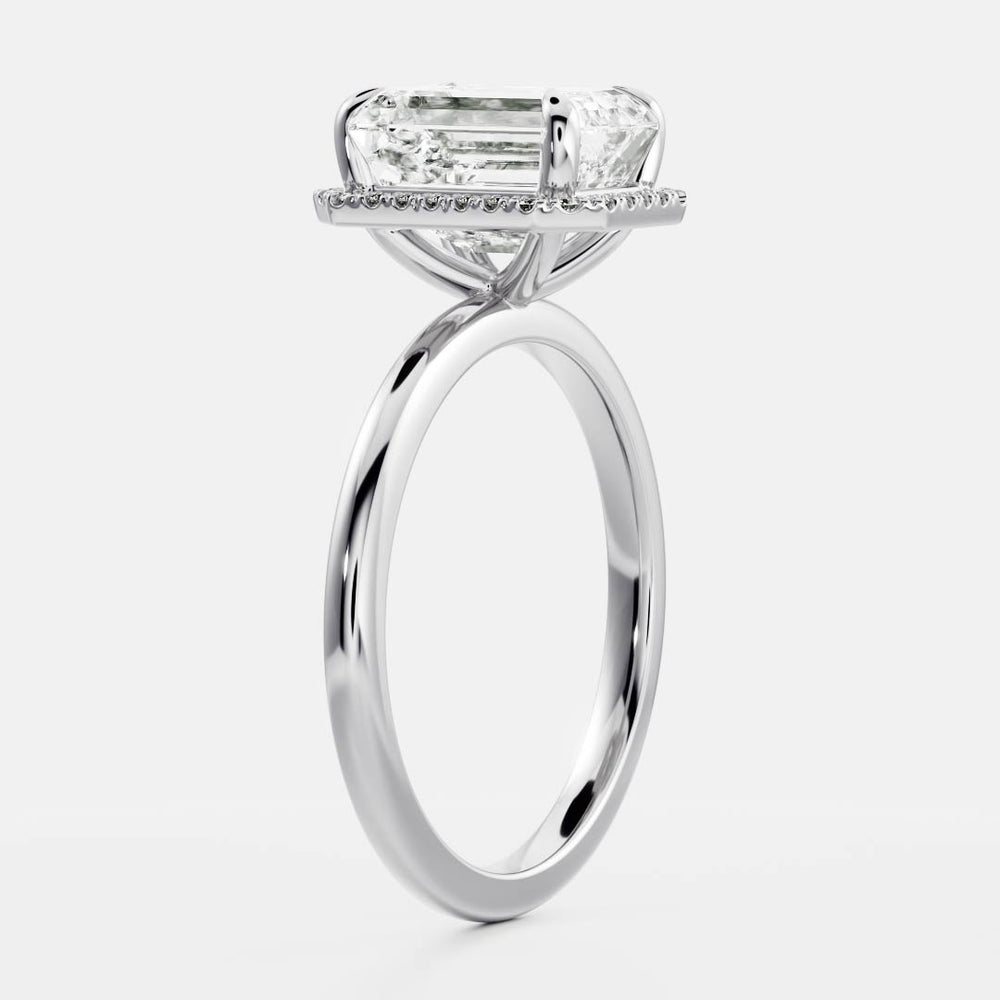 
                      
                        The Audrey Ring - Emerald Halo
                      
                    