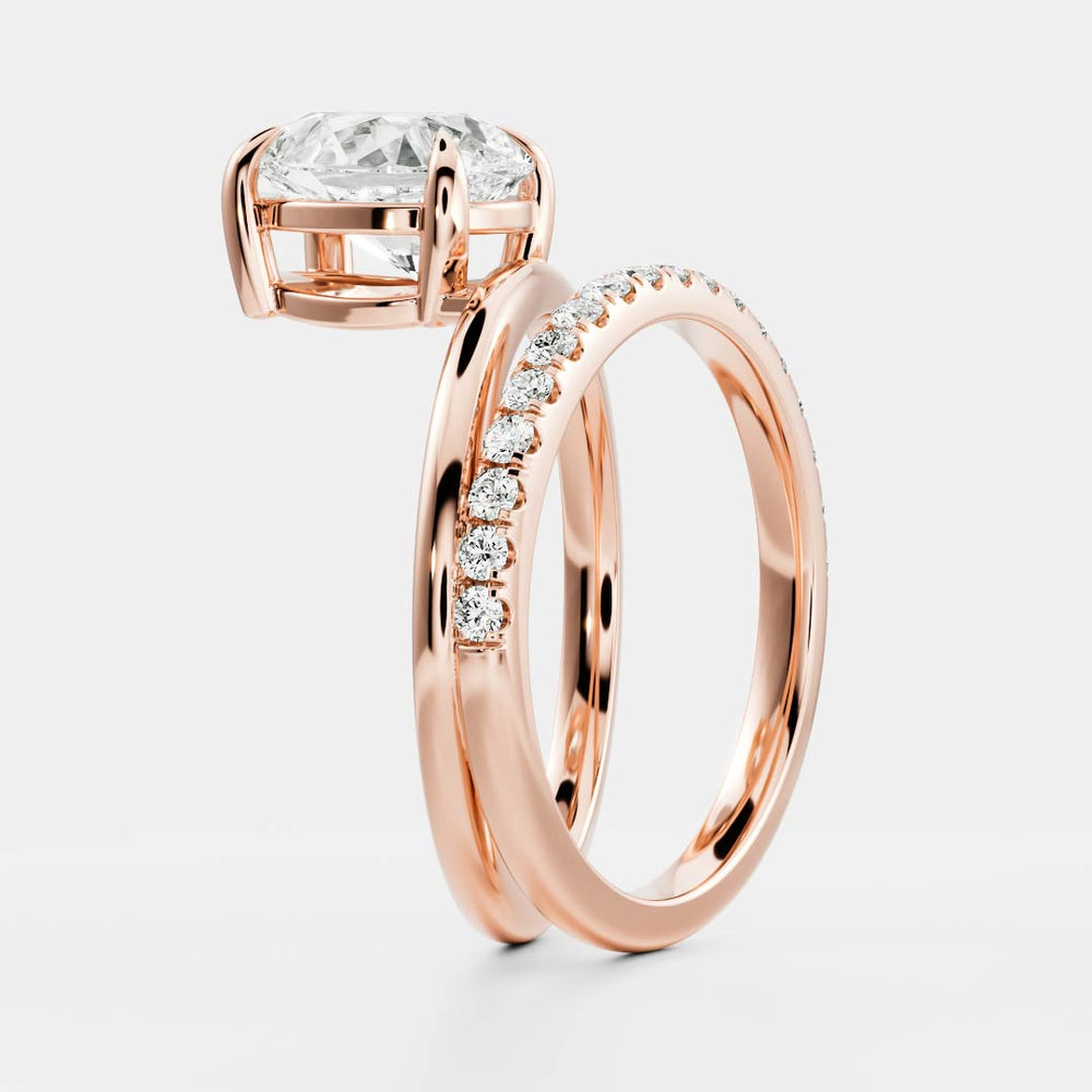 
                      
                        The Emerie Ring - Pear Double Band Solitaire
                      
                    