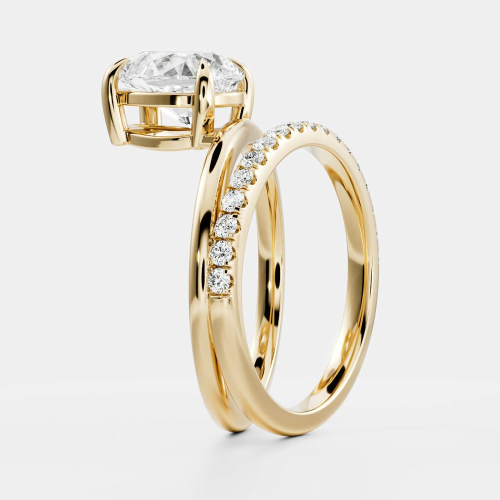 
                      
                        The Emerie Ring - Pear Double Band Solitaire
                      
                    