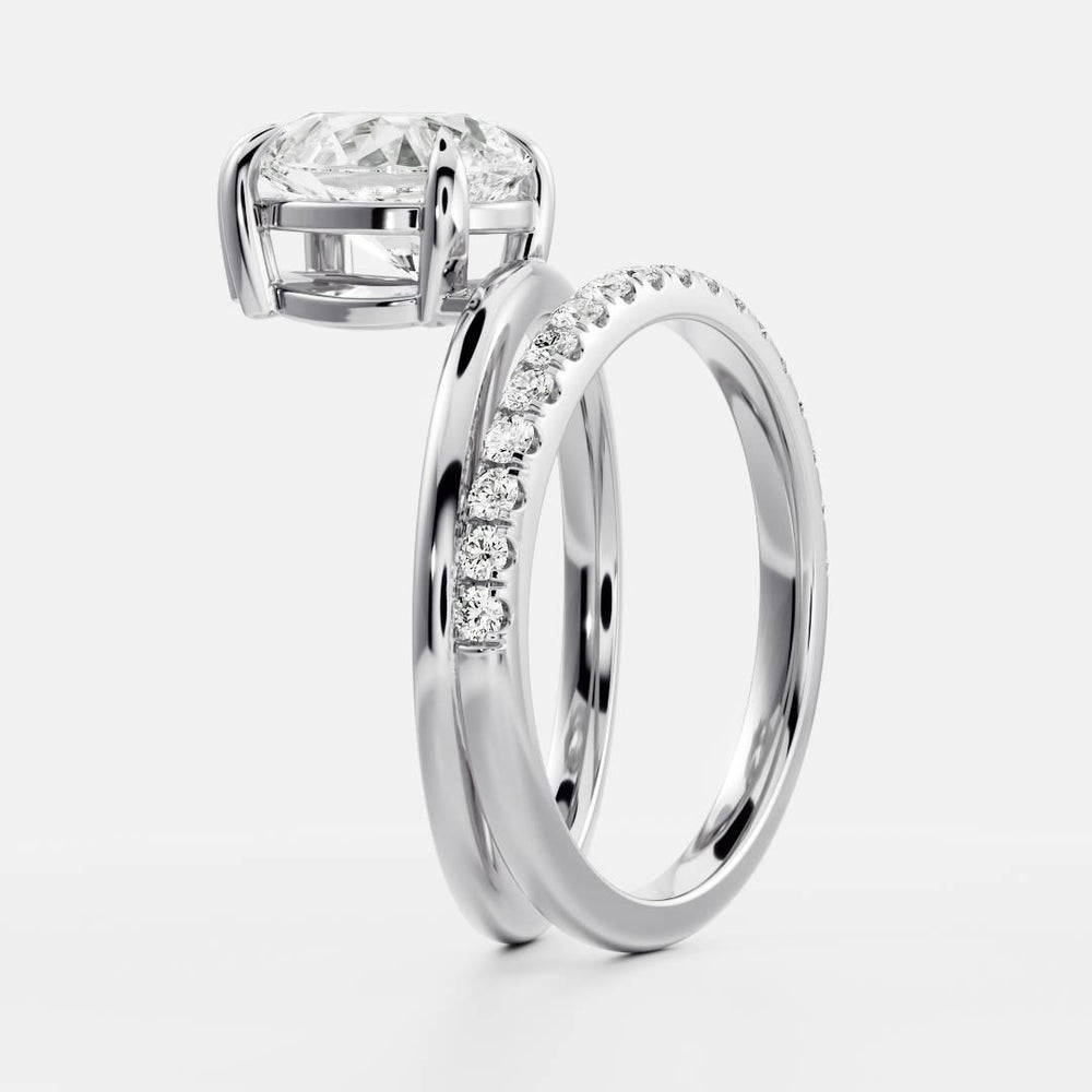 
                      
                        The Emerie Ring - Pear Double Band Solitaire
                      
                    
