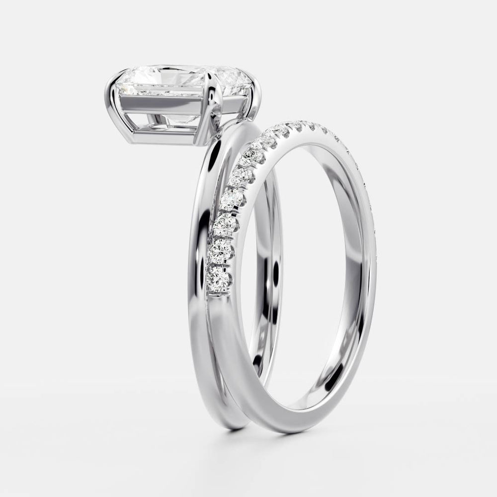 
                      
                        The Emerie Ring - Radiant Double Band Solitaire
                      
                    