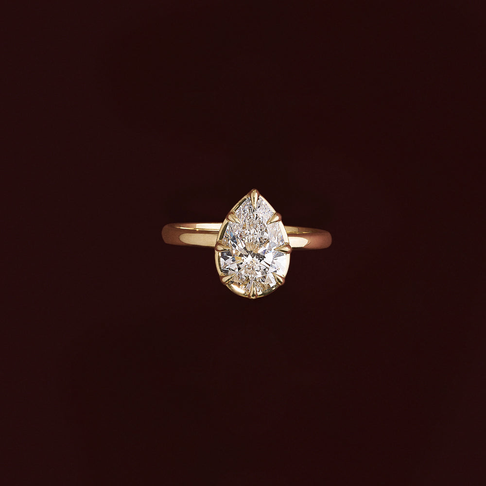 
                      
                        The Sophia Ring - Pear Georgian Solitaire
                      
                    