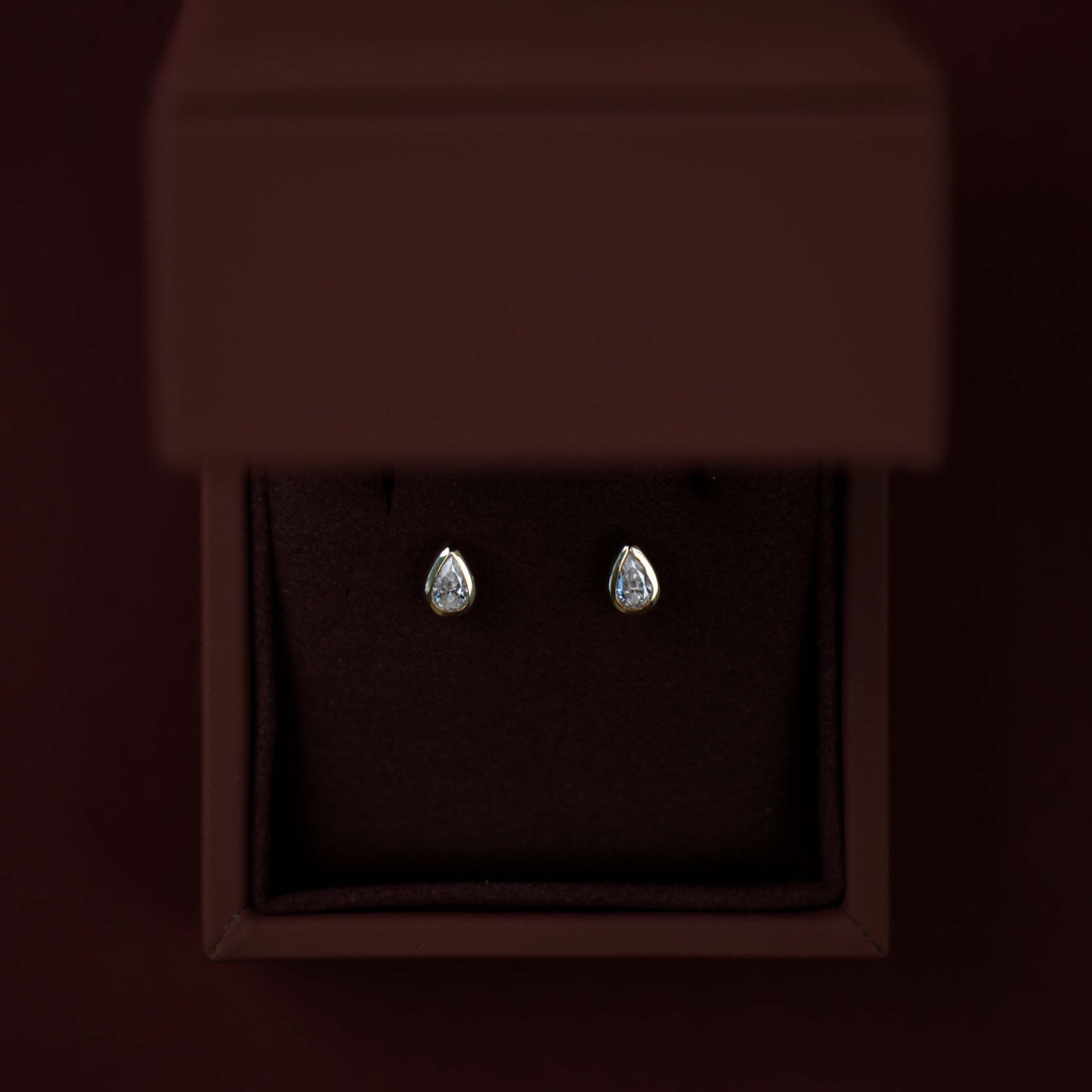 The Vera Earrings - 0.3ct Moissanite Pear Bezel Studs