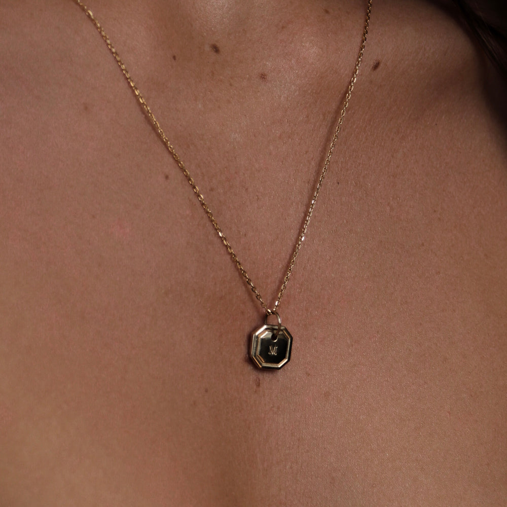 
                      
                        The Signature Octagon Letter Pendant
                      
                    