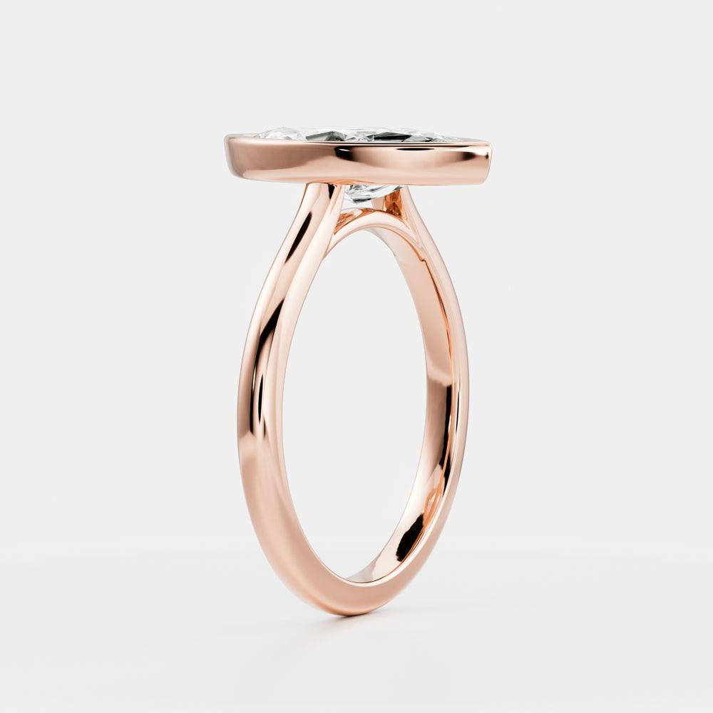 
                      
                        The Arie Ring - Marquise Bezel Solitaire
                      
                    