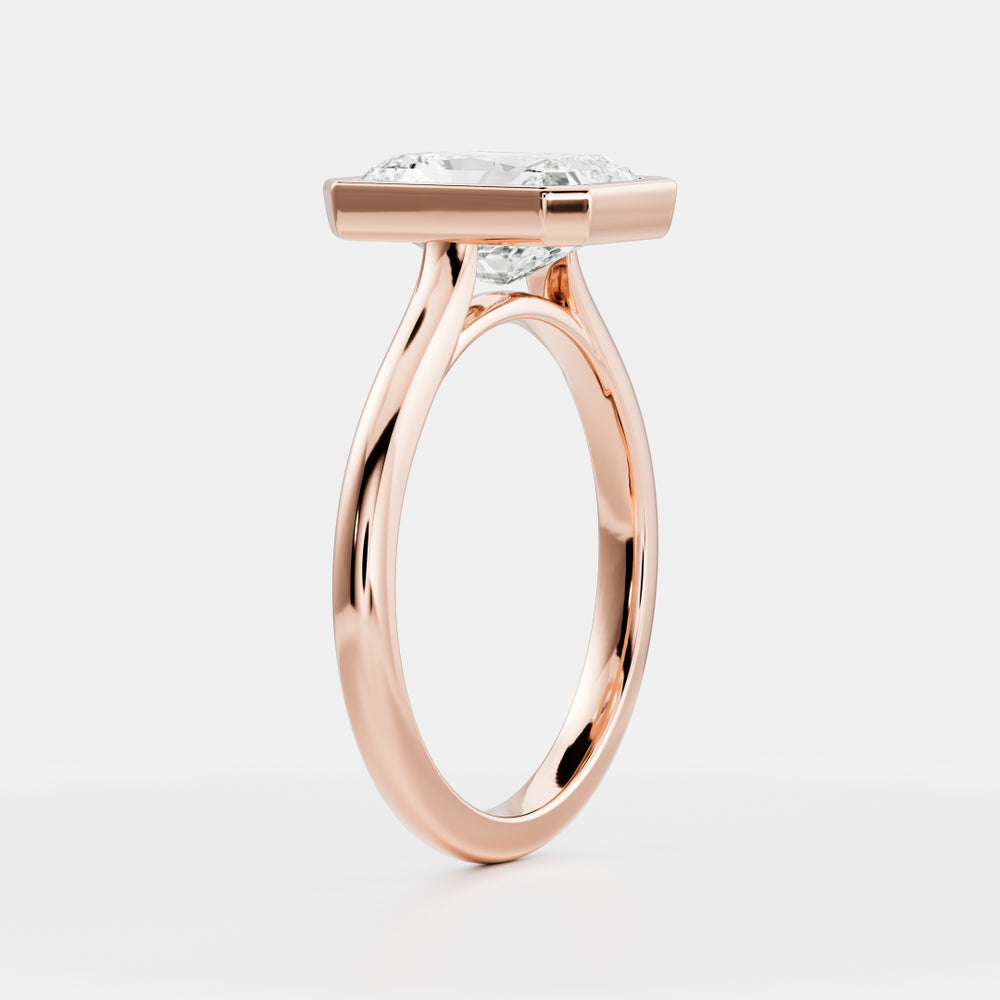 
                      
                        The Vienna Ring - Radiant Bezel Solitaire
                      
                    