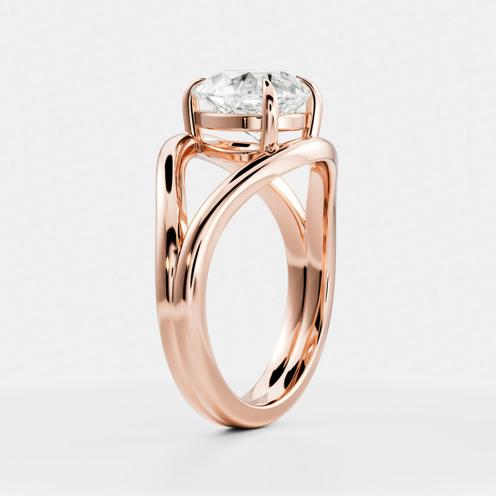 
                      
                        The Elise Ring - Split Shank Pear Solitaire
                      
                    